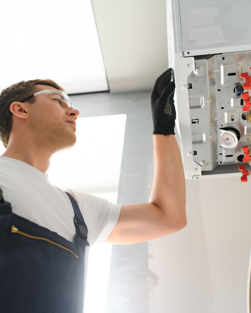 man conducting a boiler replacement